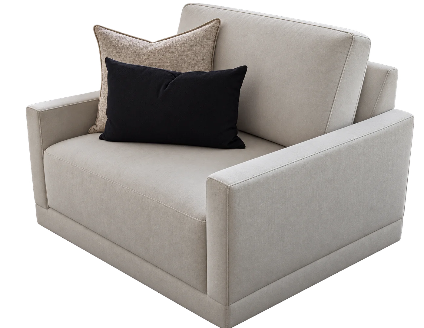 Light upholstered armchair with two loose pillows